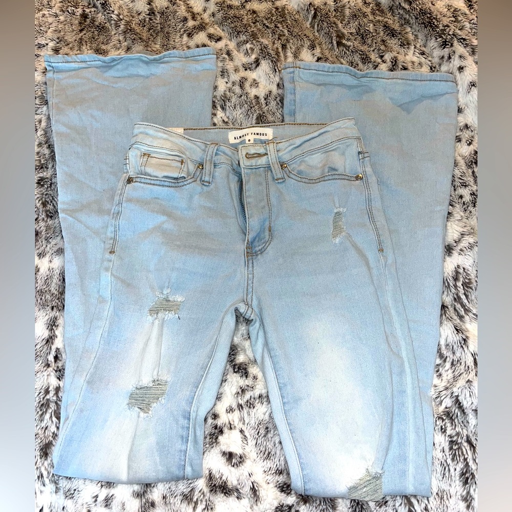 bell bottom light washes blue jeans size 0